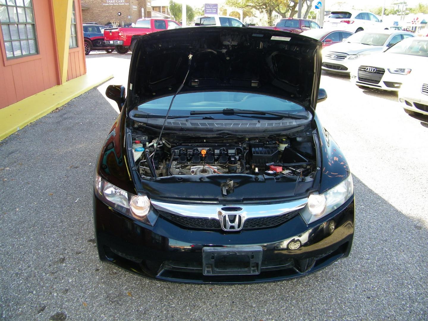 2011 Black /Gray Honda Civic LX Sedan 5-Speed AT (19XFA1F5XBE) with an 1.8L L4 SOHC 16V engine, 5-Speed Automatic transmission, located at 4000 Bee Ridge Road, Sarasota, FL, 34233, (941) 926-0300, 27.298664, -82.489151 - Photo#10